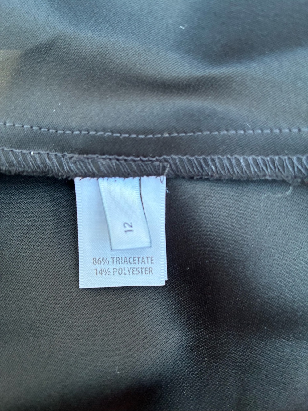 NWOT ST. JOHN Liquid Satin Shirt in Black
Size 12 - Picture 12 of 13